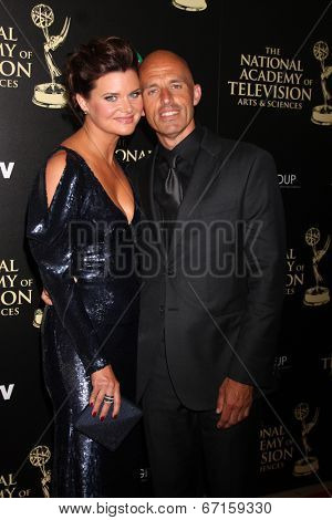 LOS ANGELES - JUN 22:  Heather Tom, James Achor at the 2014 Daytime Emmy Awards Arrivals at the Beverly Hilton Hotel on June 22, 2014 in Beverly Hills, CA