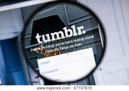 Ostersund, Sweden - June 21, 2014: Close up of tumblr website under a magnifying glass.Tumblr is a microblogging platform and a social networking website 