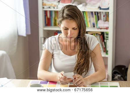 Pregnant woman working from home