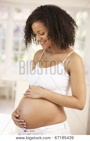 Pregnant woman at home
