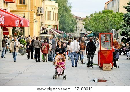 eople walking around in Bitola