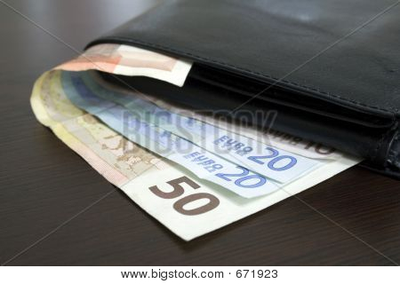 Euro Bills On Table