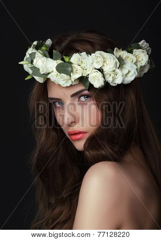 Luxurious Woman In Chaplet Of Fresh Flowers
