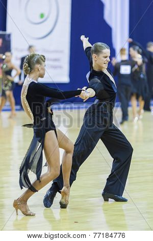 Minsk-belarus, October 4,2014: Unidentified Professional Dance Couple Performs Youth-2 Latin-america