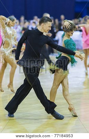 Minsk-belarus, October 4,2014: Unidentified Professional Dance Couple Performs Youth-2 Latin-america