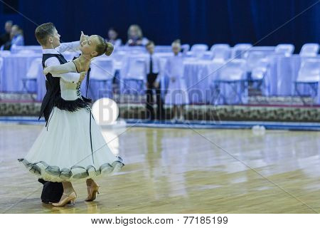 Minsk-belarus, October 4,2014: Unidentified Dance Couple Performs Juvenile-1 Standard European Progr
