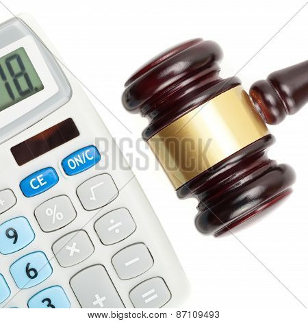 Judge's Gavel And Calculator. Studio Shot Over White