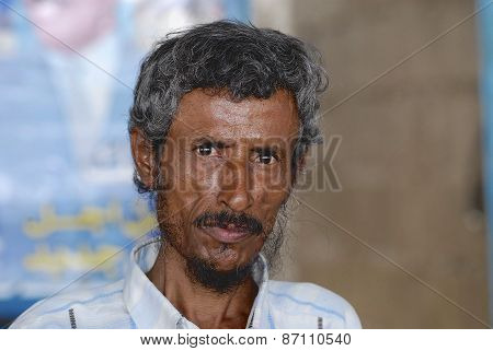 Portrait of unidentified senior man in Aden, Yemen.