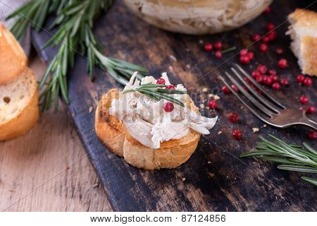 Toast Bread With Chicken Pate On Rustic Kitchen Board