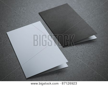 Two blank half-fold brochures