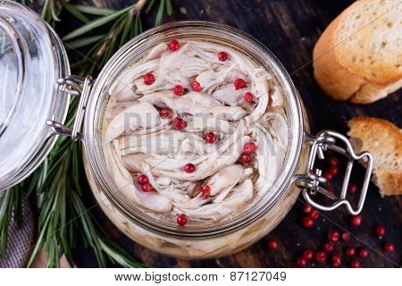 Chicken Pate In Glass Jar And Toast Bread On Rustic Kitchen Board