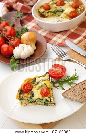 One Piece Of Kale Tomato Frittata