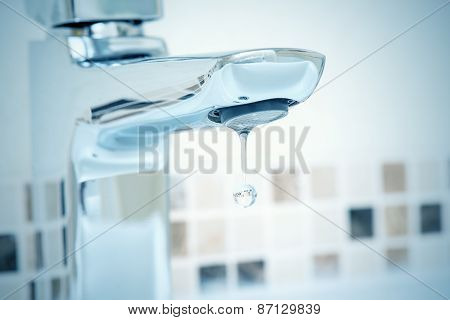 Tap And Water Dripping