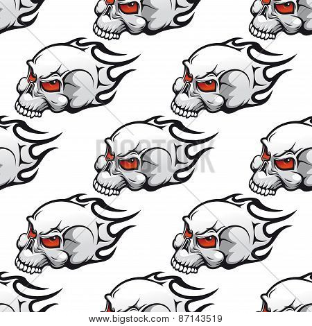 Cartoon skulls with tribal flames seamless pattern