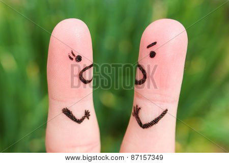 Finger art of a couple during quarrel. The concept of a man and woman yelling at each other.