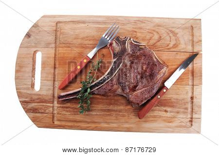 savory : grilled spare rib on wooden plate with thyme isolated over white background