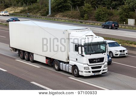 Man Truck With A Trailer On German Highway