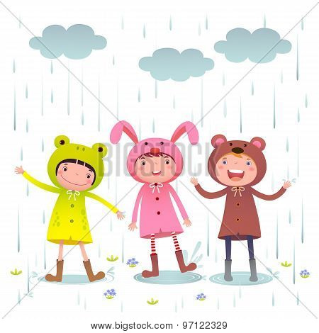 Kids Wearing Colorful Raincoats And Boots Playing On Rainy Day