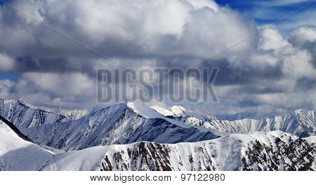 Winter Sunlight Mountains In Clouds