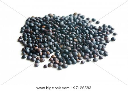 Beluga. Black lentil on white background.