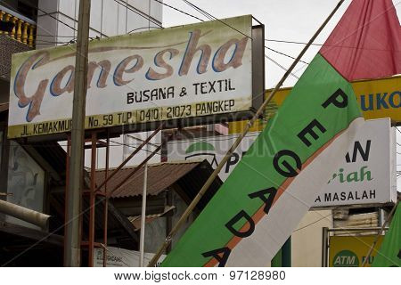 Close Up Of Shops Billboard