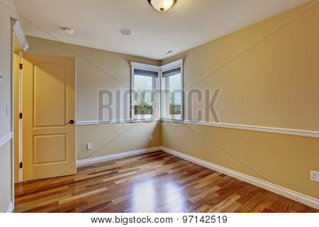 Unfurnished Room With Hardwood Floor.