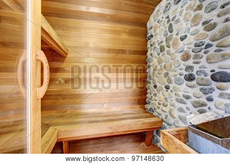 Perfect Sauna Room With Wood Walls And Bench.