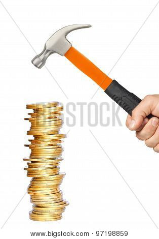 Golden Coins And Hammer In Man Hand Isolated On White