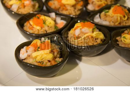 Close up rice with shrimp eggs on top Japanease foood.
