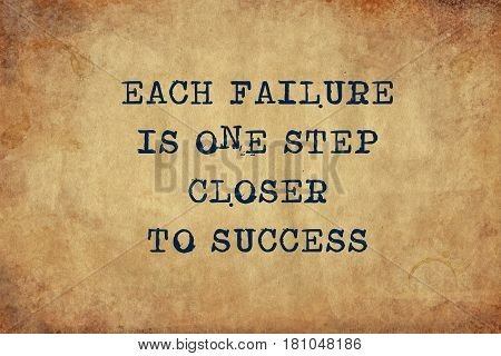 Inspiring motivation quote of each failure is one step closer to success with typewriter text. Distressed Old Paper with Typing image.