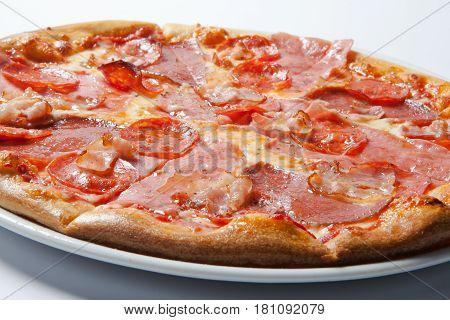 Italian Delicious Pizza With Mushrooms And Ham.