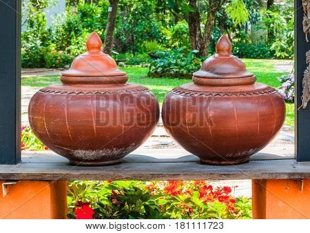 Closeup To Couple Of Brown Baked Clay Flagon In Ancient Tradition Northern Thai Style