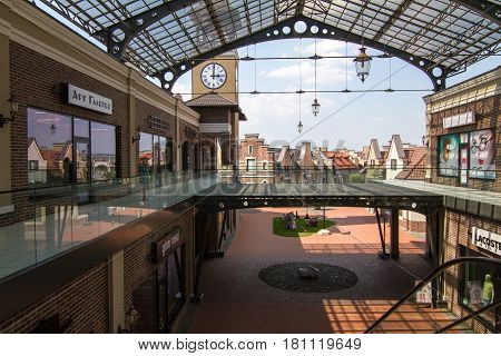 Kyiv, Ukraine - July 31, 2014: Village outlet Manufacture, dutch village with shops, modern architecture in fachwerk style