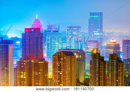 TAIPEI TAIWAN - MARCH 20: This is a view of Xinyi financial district skyscrapers and high rise buildings at night on March 20 2017 in Taipei