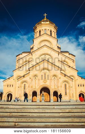 Photo of Holy Trinity Cathedral Tsminda Sameba in Tbilisi, Georgia. Georgian Orthodox Church. Welcome To Georgia. Tourist attraction. Religious background. Travel concept. Caucasus region. Vertical