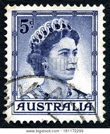 AUSTRALIA - CIRCA 1959: A used postage stamp from Australia depicting a portrait of Queen Elizabeth II circa 1959.