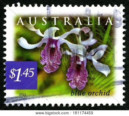 AUSTRALIA - CIRCA 2003: A used postage stamp from Australia depicting an image of a Blue Orchid circa 2003.