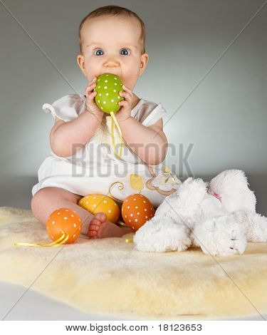 Young Cute Baby In An Easter Setting