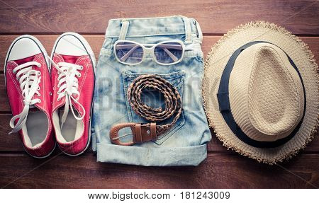 Travel Clothing accessories Apparel along on wood floow