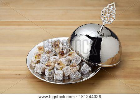 traditional turkish delight plate on wooden table
