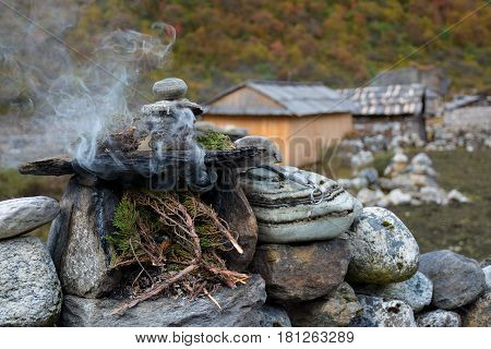 Burning juniper twigs - tibetian ritual tribute to the spirits for protection and good luck.