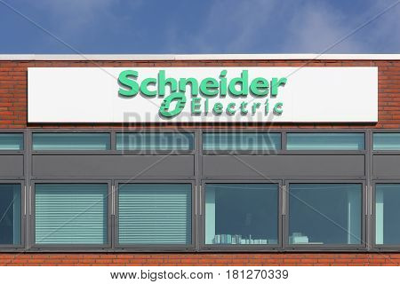 Odense, Denmark - April 2, 2017; Schneider Electric logo on a facade. Schneider Electric is a European multinational corporation, leader in automation and electricity management.