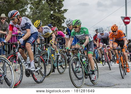 Barcelona Spain - March27 2016: The peloton riding during Volta Ciclista a Catalunya on the road to the top of Montjuic in Bracelona Spain on March 27 2016.