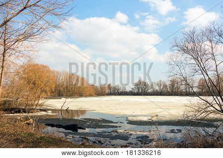 Early spring, melting snow and ice, the forest lake is freed of ice 3