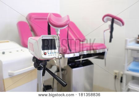 gynecological chair and other medical equipment in a gynecological office