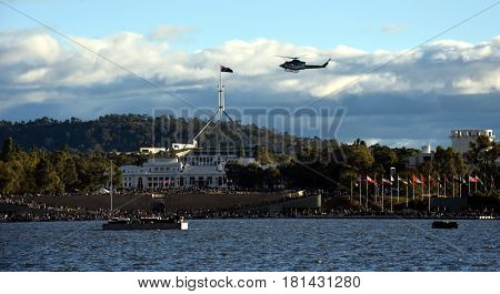 Canberra Australia - March 18 2017. Low flyover by the Snowy Hydro Southcare Rescue Helicopter at Regatta Point in the Commonwealth Park.