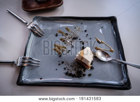 Banana Cake with spoon on white table