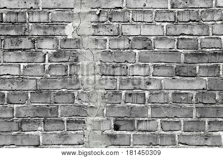 Old brick wall background. Grunge texture. Black wallpaper. Dark surface