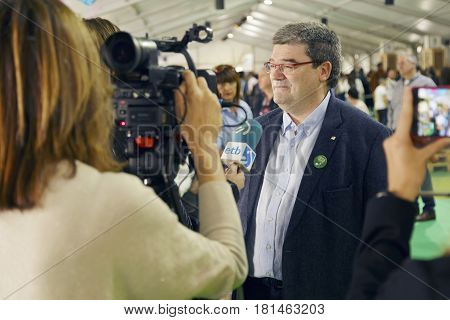 BILBAO SPAIN - APRIL 13 2017: Juan Maria Aburto Mayor of the city of Bilbao being interviewed during the Basque fest 2017.