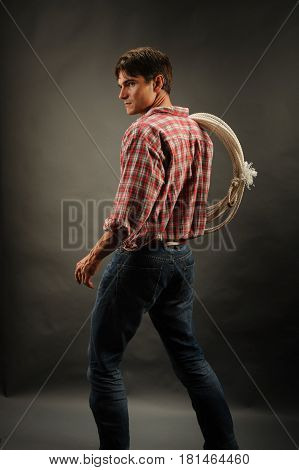 the sexy man is waiting for his horse.